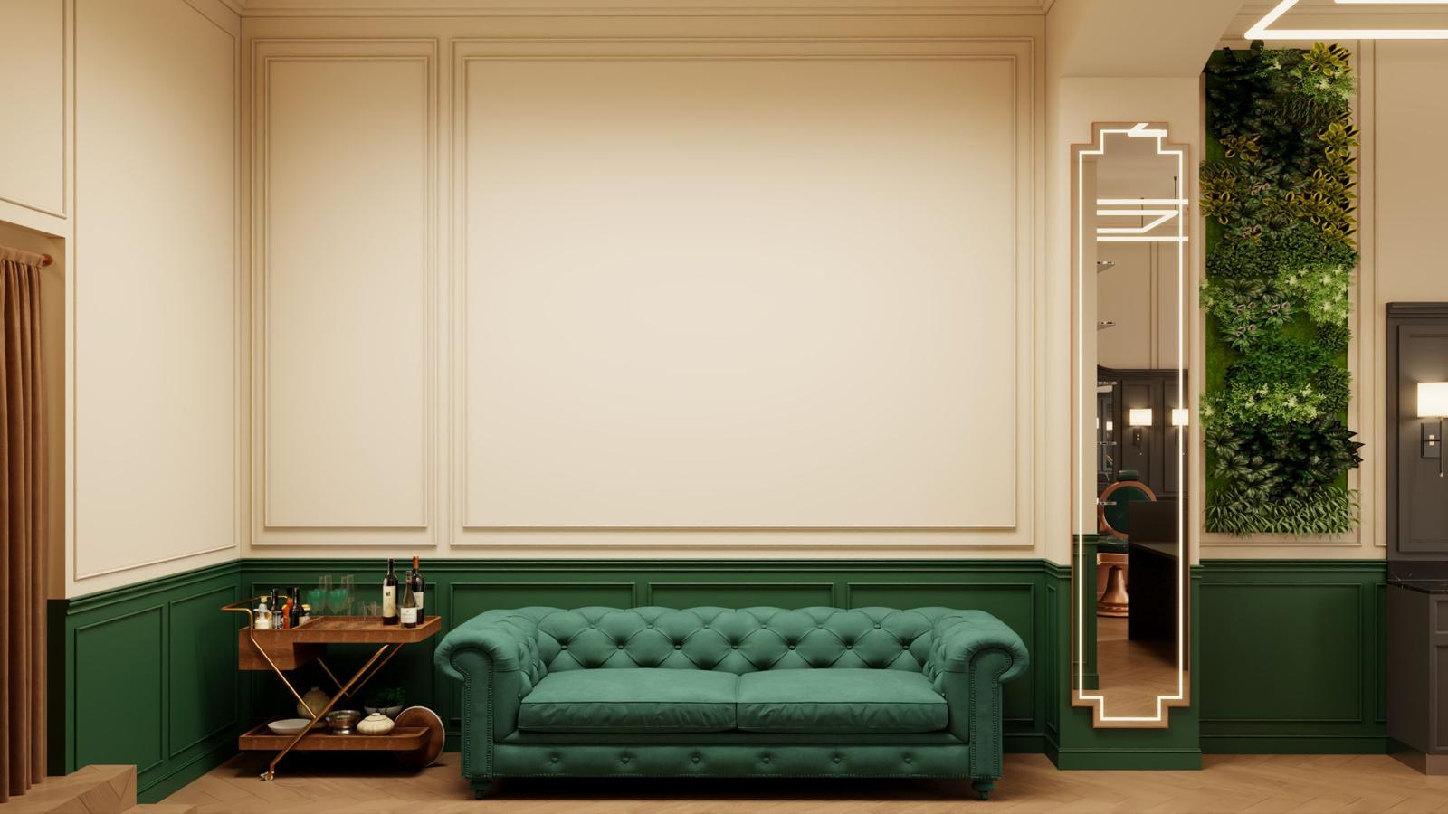 Green tufted sofa centered against beige and green paneled wall with a wooden bar cart on the left and a tall mirror with plants on the right.